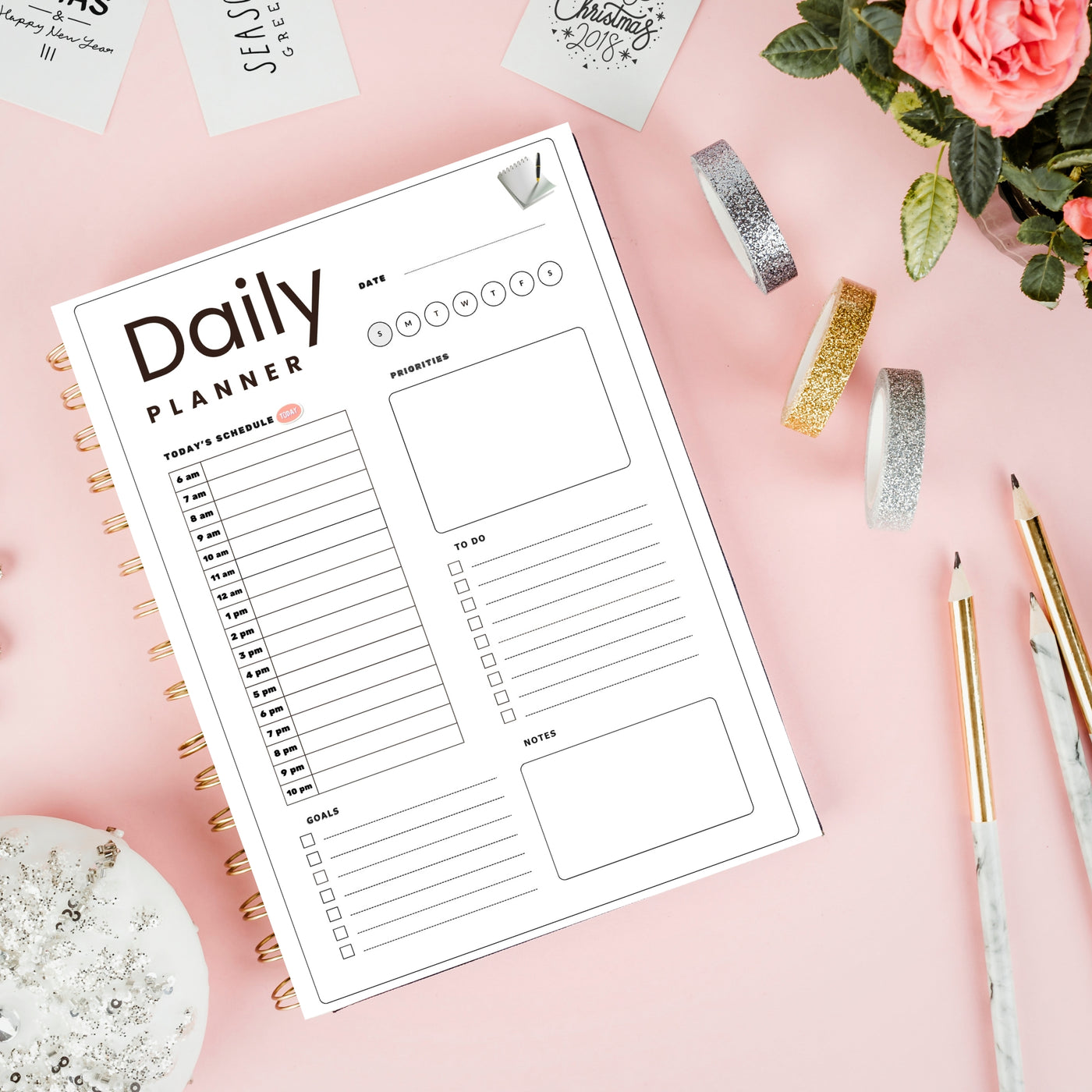 Sharpbryte daily planner page mockup on pink desk with pens washi tape and flowers hourly schedule planner printable